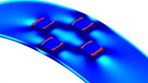 Modeling delamination of silicon die from a stretched flexible substrate